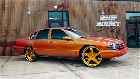 WhipAddict: Orange Pearl 96' Chevy Impala SS on Gold 26s with Football ...