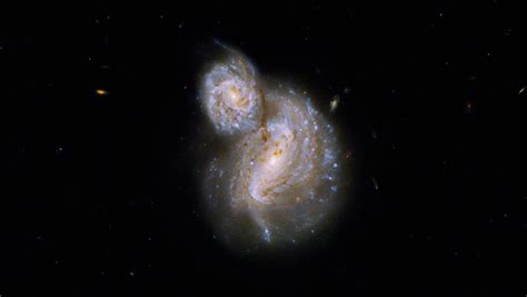 Hubble telescope snaps trippy new view of two swirling galaxies | Space