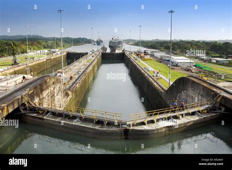 The Panama Canal lock system with lock gates closed and ship entering a ...