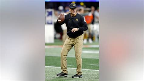 Jim Harbaugh Squats Shirtless And In Khakis