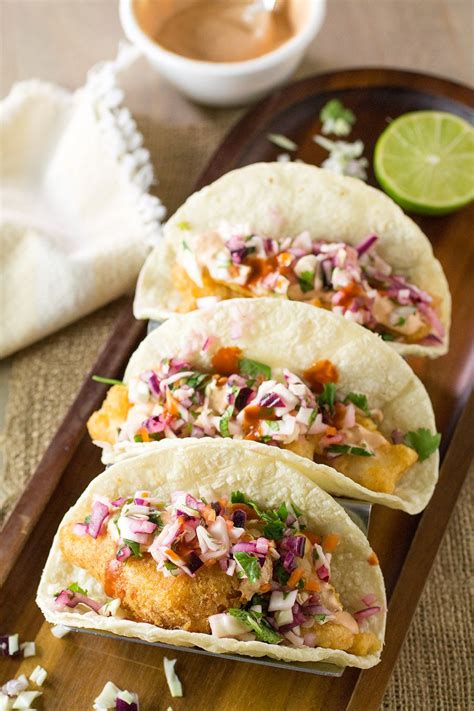 Beer Battered Fish Tacos with Spicy Habanero Slaw - Recipe | Beer battered fish tacos, Fish ...