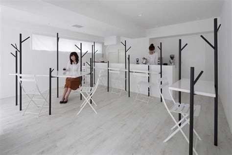 Minimalist Coffee Shop Design Is Built Around Stylized Trees - Mindful ...