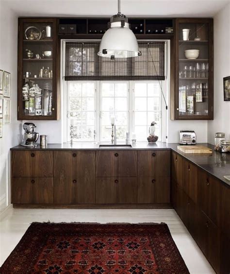 Glass Front Kitchen Cabinet Doors Aren’t Just Beautiful | Dark wood kitchen cabinets, Kitchen ...