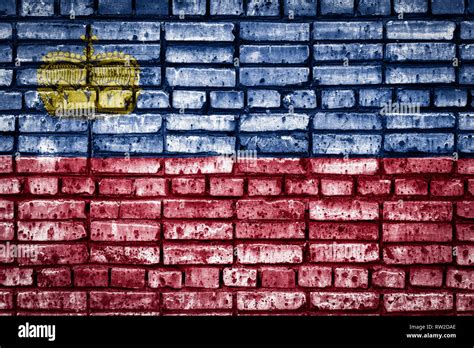 National flag of Liechtenstein on a brick background. Concept image for ...