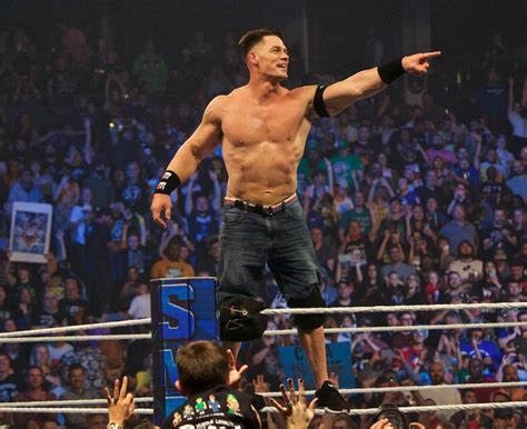 Hometown fans watch John Cena defeat champion Roman Reigns on WWE 'Friday Night Smackdown' in ...