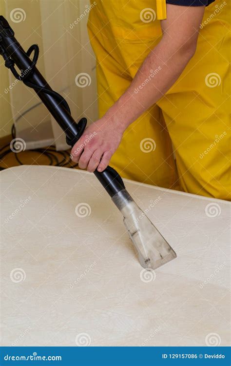 Dry cleaning of a mattress stock photo. Image of chemical - 129157086