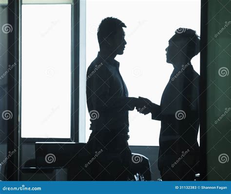 Businessmen Shaking Hands in Office, Silhouette Stock Image - Image of agreement, horizontal ...