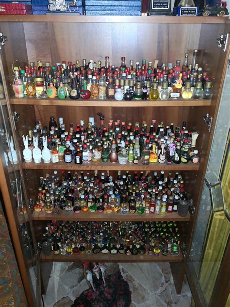 My grandfather's collection of mini bottles : r/liquor