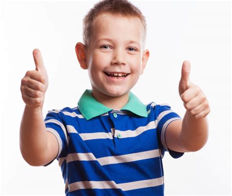 Portrait of happy boy showing thumbs up gesture | Children’s Hearings Improvement Partnership