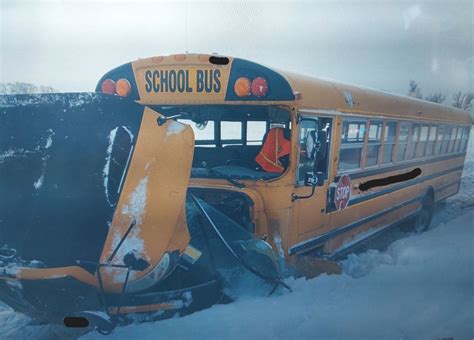 3 hurt after elementary school bus slides off snowy road east of ...