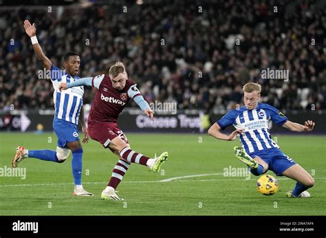 West Ham United's Jarrod Bowen (centre) attempts a shot on goal during ...