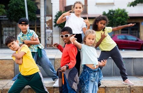 Tweens Dancing in Circle with Coach Stock Photo - Image of group, indoors: 234627350