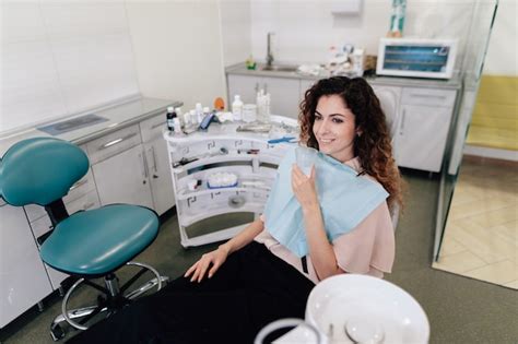 Free Photo | Smiling woman at the dentist office