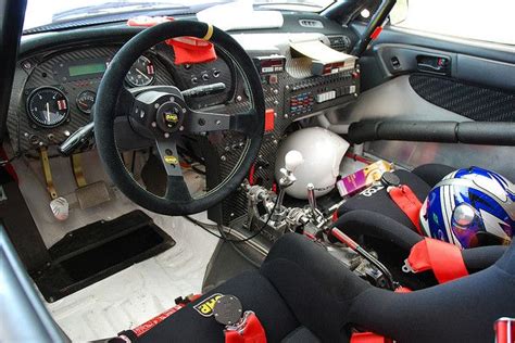 Rally Car Interior with Steering Wheel and Dashboard