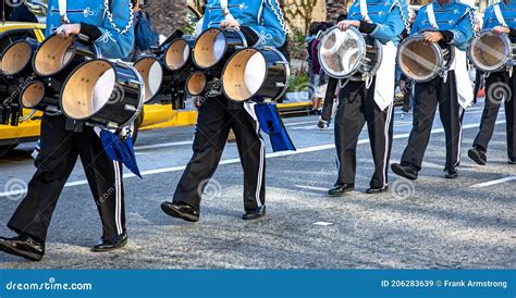 Marching Band with Tubas Dressed in Blue Performing in a Parade ...