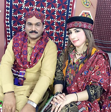 Ahmed Mughal and a tv host dressed in Sindhi cultural dress on Sindh culture day in Karachi 2015 ...