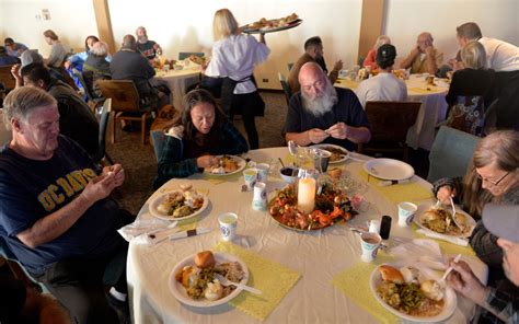 Hundreds dine on Thanksgiving meal from Coast Christian Fellowship ...