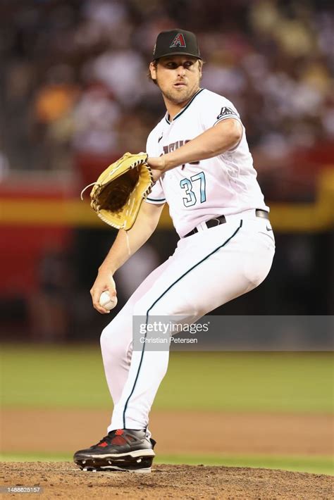 Relief pitcher Kevin Ginkel of the Arizona Diamondbacks pitches... News ...