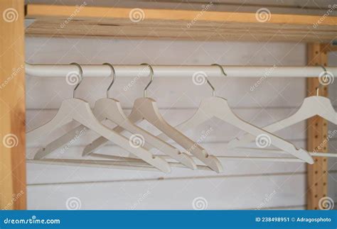 White Wood Hangers in a Closet from a Mountain Cabin. Stock Image ...