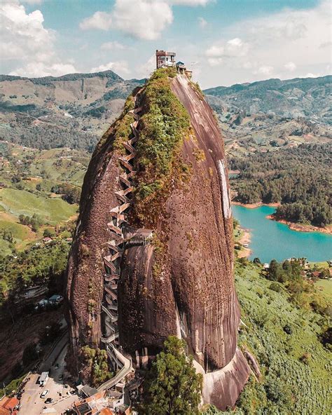 Would you climb these stairs of The Rock of Guatapé?👇💬 El Peñol, Colombia. Photo by ...