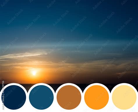 Color Palette Of Blue And Orange Sun Rise Over The Ocean Stock Photo ...