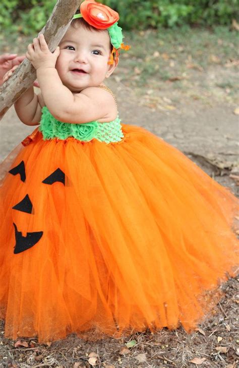 Halloween Decor | Honey We're Home | Baby girl halloween costumes, Pumpkin costume, Baby pumpkin ...