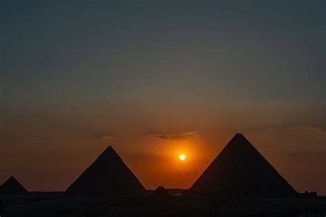 Silhouette of Pyramid During Sunset · Free Stock Photo