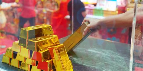 Lift a 10kg gold bar at Chinatown Point and stand a chance to win up to ...