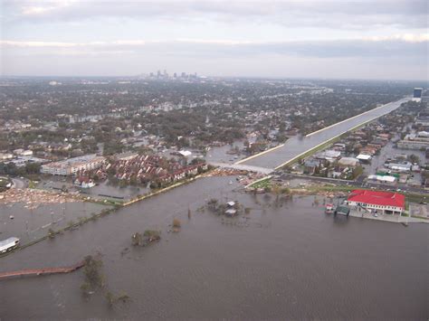 A breached levee floods New Orleans after Hurricane Katrina : CatastrophicFailure