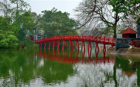 The Huc bridge on Lake Hoan Kiem Photograph by Sanh Tran | Pixels