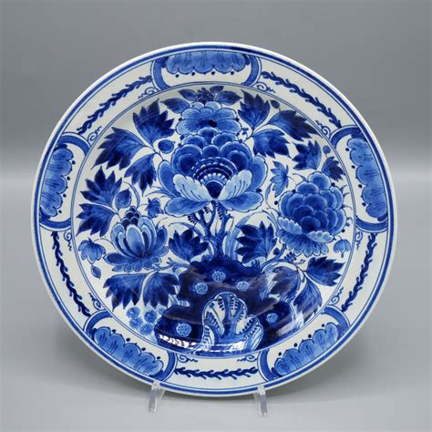 Stunningly beautiful Delft Blue wall plate, decorated with beautifully stylized chinoiserie ...