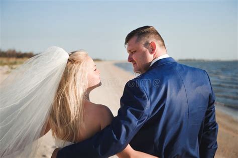 Couple in Love on the Beach on Their Wedding Day. Stock Image - Image of happiness, marriage ...