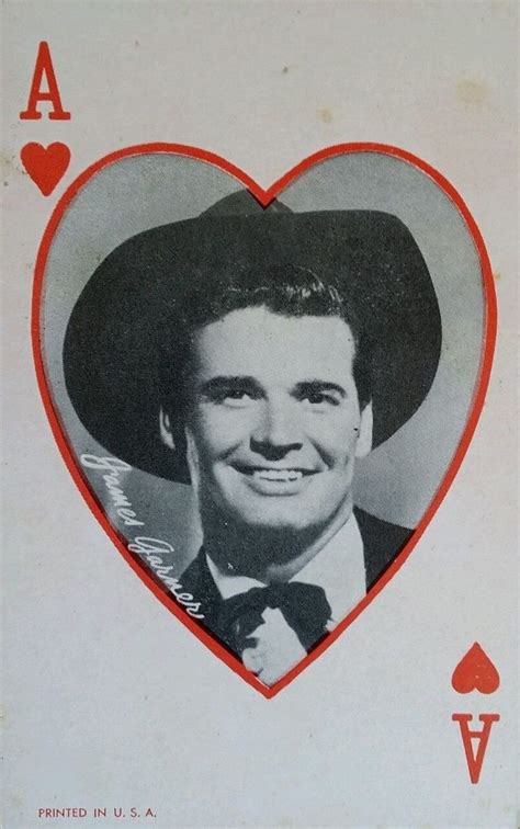 an old photo of a man wearing a hat and bow tie in a heart - shaped card