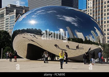 Reflections in The Bean, Chicago, Illinois, USA. This bean attracts ...