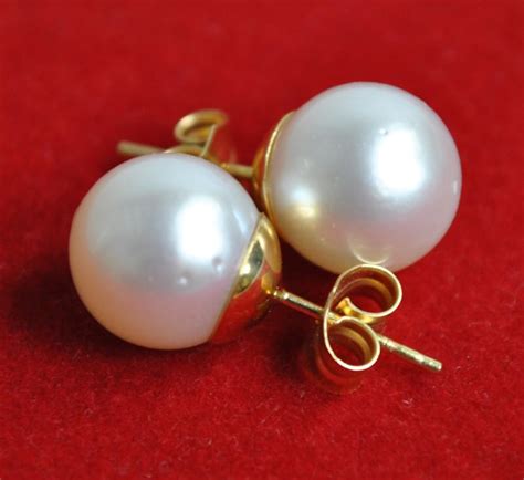 Earrings made of gold and Australian pearls 10 mm in diameter - Catawiki