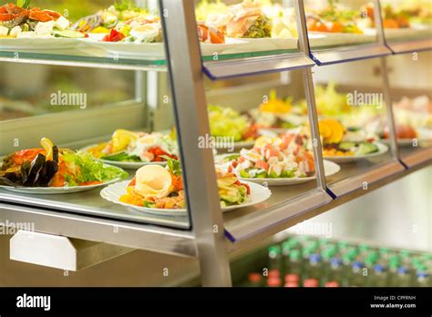 Canteen self-service food display plate with fresh made salad Stock Photo - Alamy