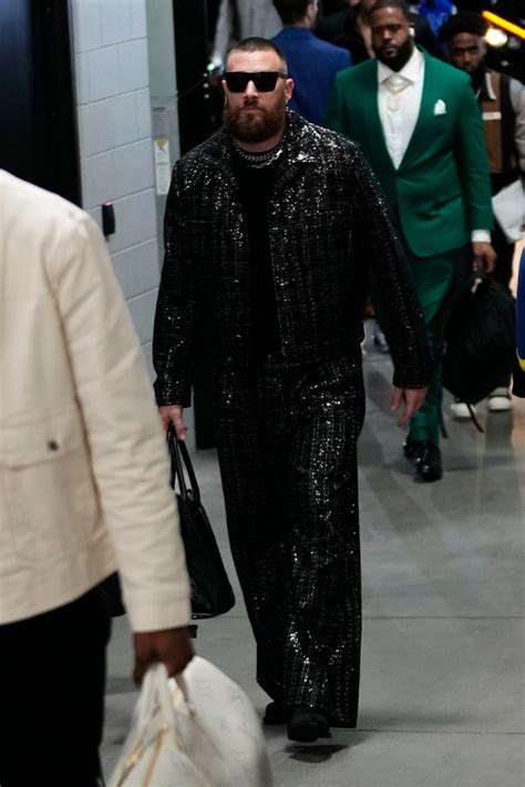 Travis Kelce arrives at Super Bowl 2024 in sparkling black suit