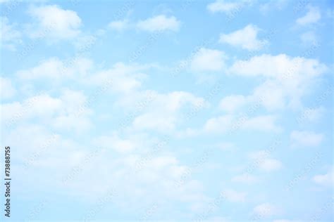 Light blue sky with clouds Stock Photo | Adobe Stock