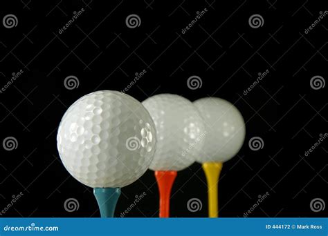 Three Golf Balls stock photo. Image of drive, orange, blue - 444172