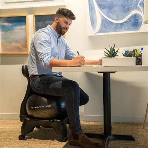 Yoga Ball Chair Vs Ergonomic Chair: Which One Should You Choose? - OfficeGearLab