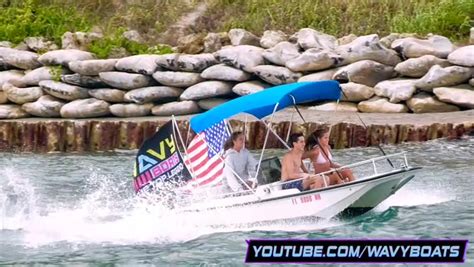 The UNCENSORED flag version of the Blue Top Legend flying through Boca Inlet! Another channel is ...