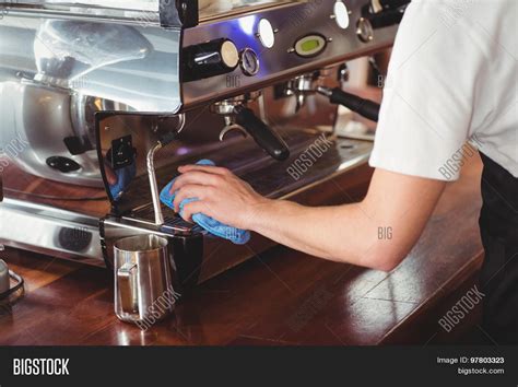 Barista Cleaning Coffee Machine Image & Photo | Bigstock