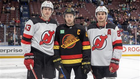 The Hughes brothers had a historic night on the ice, playing in the ...