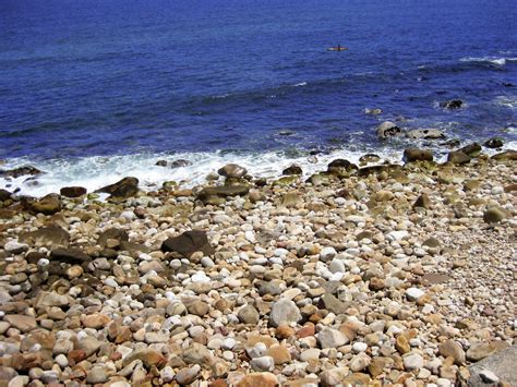 Canoeing Off Rocky Beach Free Stock Photo - Public Domain Pictures