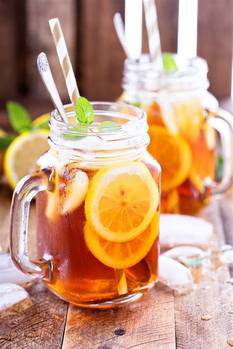 Iced tea with lemon slices stock image. Image of colorful - 71483337