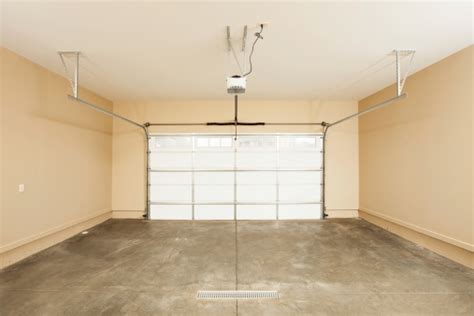 Two Car Garage Interior With Door Stock Photo - Download Image Now - iStock