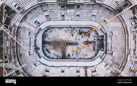 Aerial view of the construction site of a large sports stadium ...