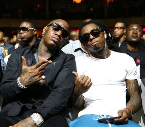 Birdman Addresses Viral Photo of Kissing Lil Wayne