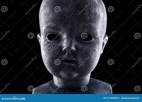 Creepy doll in the dark stock image. Image of black - 211256533