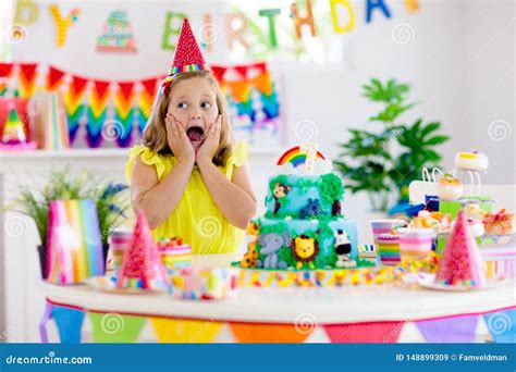 Child Birthday Party. Kids Blow Candle on Cake Stock Image - Image of food, jungle: 148899309